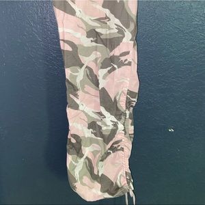 Pink army pants with cute scrunch tends at the ankle